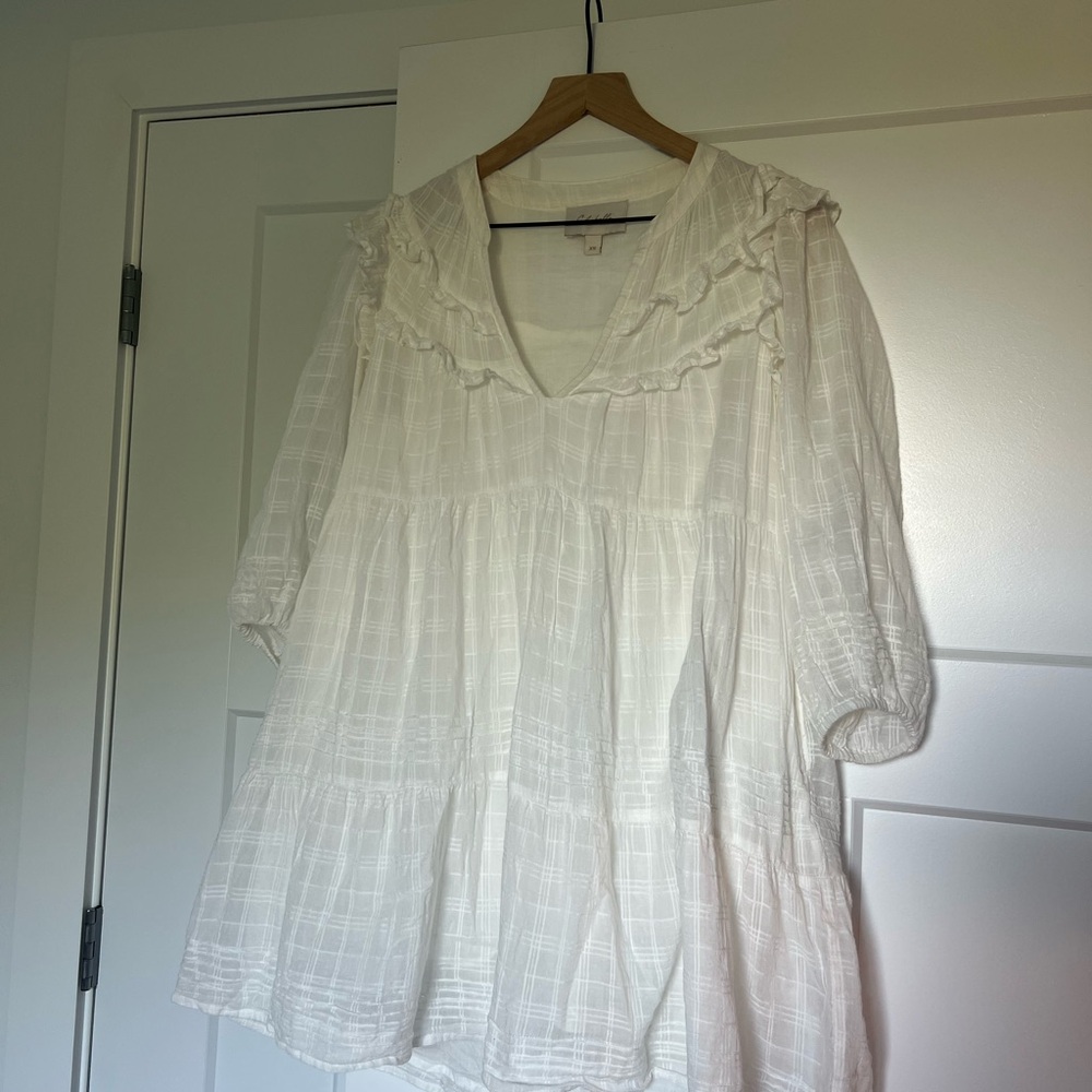 Elegant White Dress with Ruffle Details